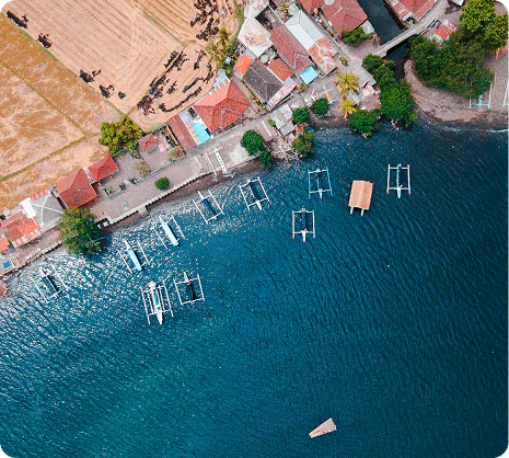 Aerial view of the Bali coastline with boats